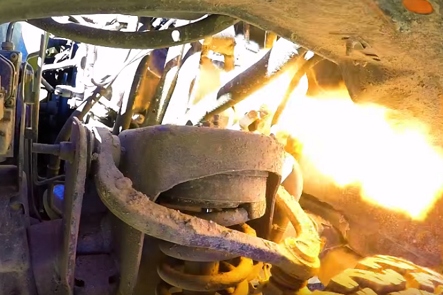 Video: Can A Running Ford V8 Withstand A .50 Caliber Bullet?