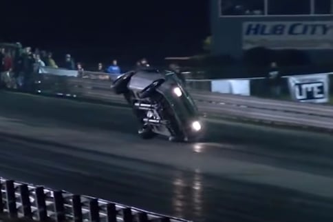 Insane Wheelstand Puts A Fox Mustang Drag Car On Its Side