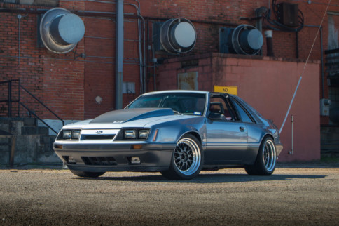 Wide, 4-Eyed, And Ready To Party - 1986 Mustang Gets Revisioned