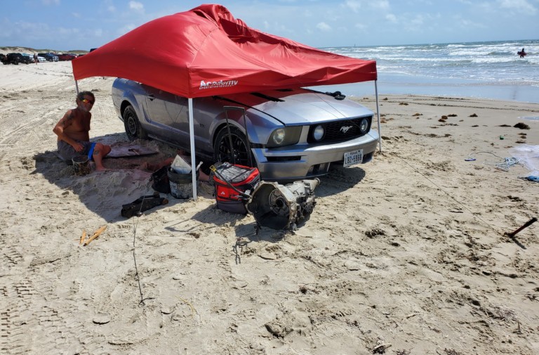 Ford Mustang Owner Swaps Transmission In Beach Dugout